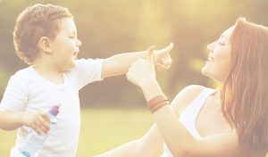 woman and a boy happy